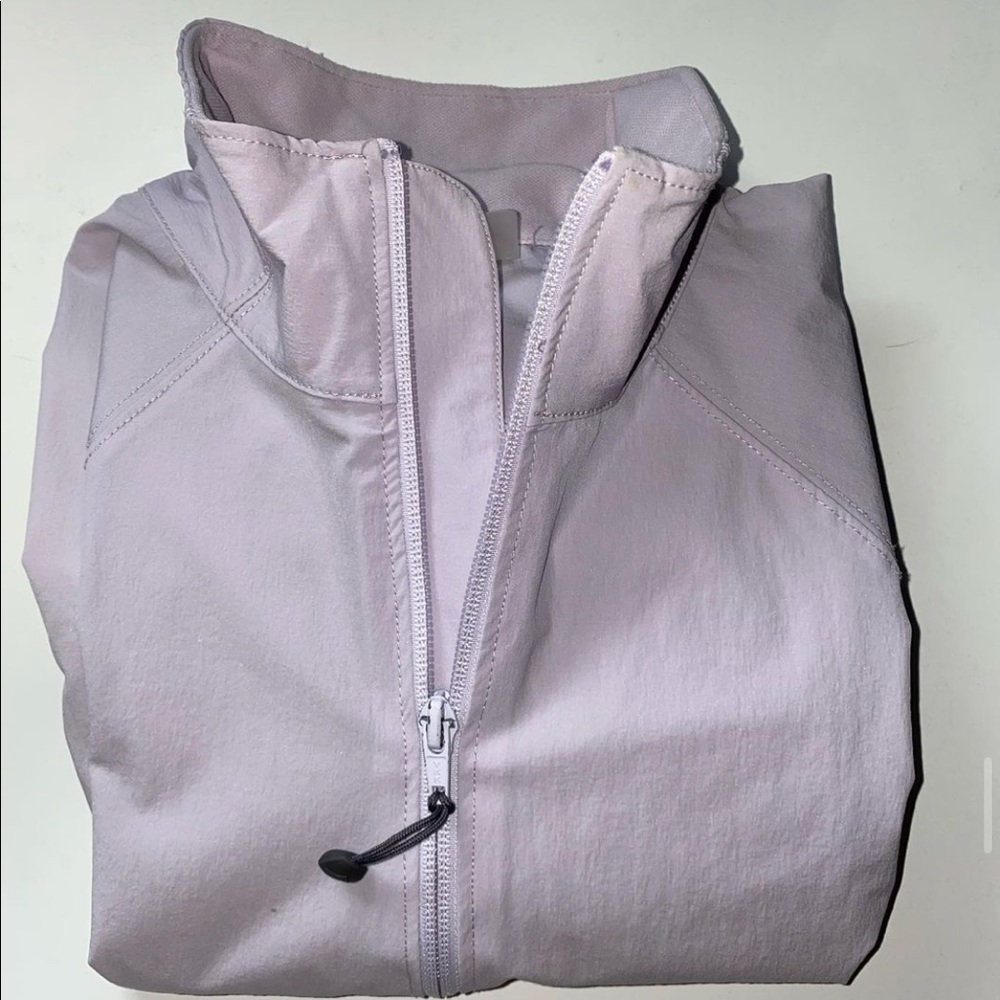 Zip up jacket.